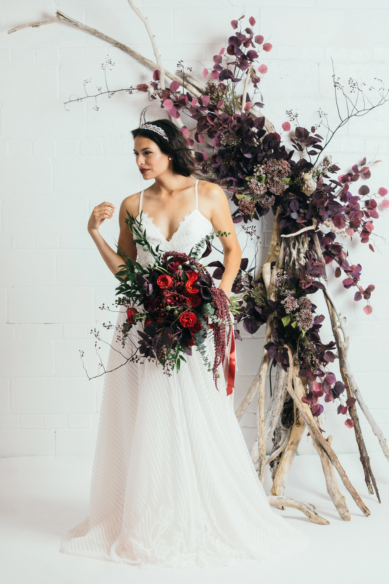 Beautiful boho-style chic bride portrait captured indoors by Brantford wedding photographer Alissa Baltazar, serving Southern Ontario couples.