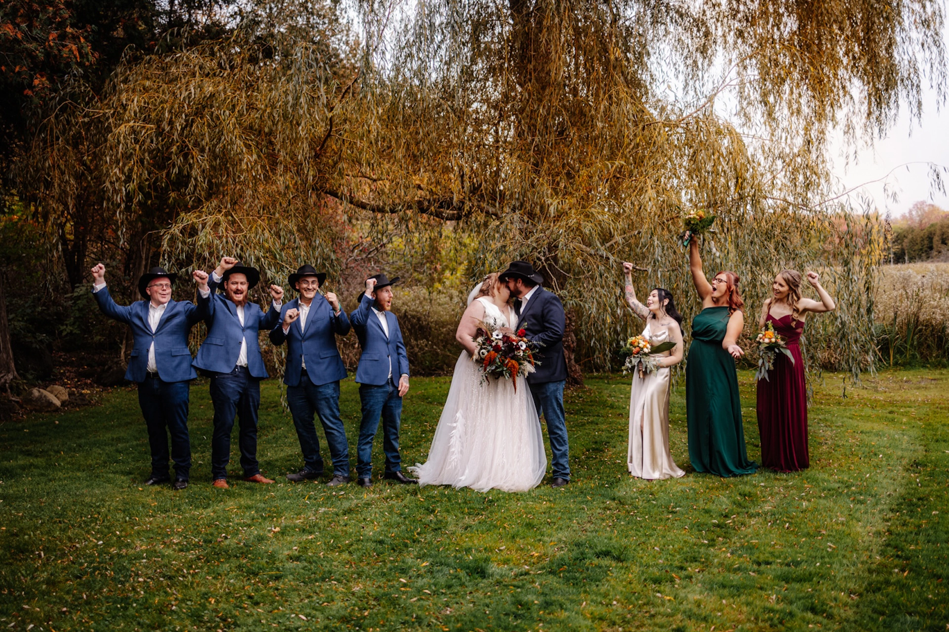 Joyful bridal party enjoying a beautiful day at Romanian Park, captured in vibrant and natural wedding photography in Brantford and Southern Ontario.