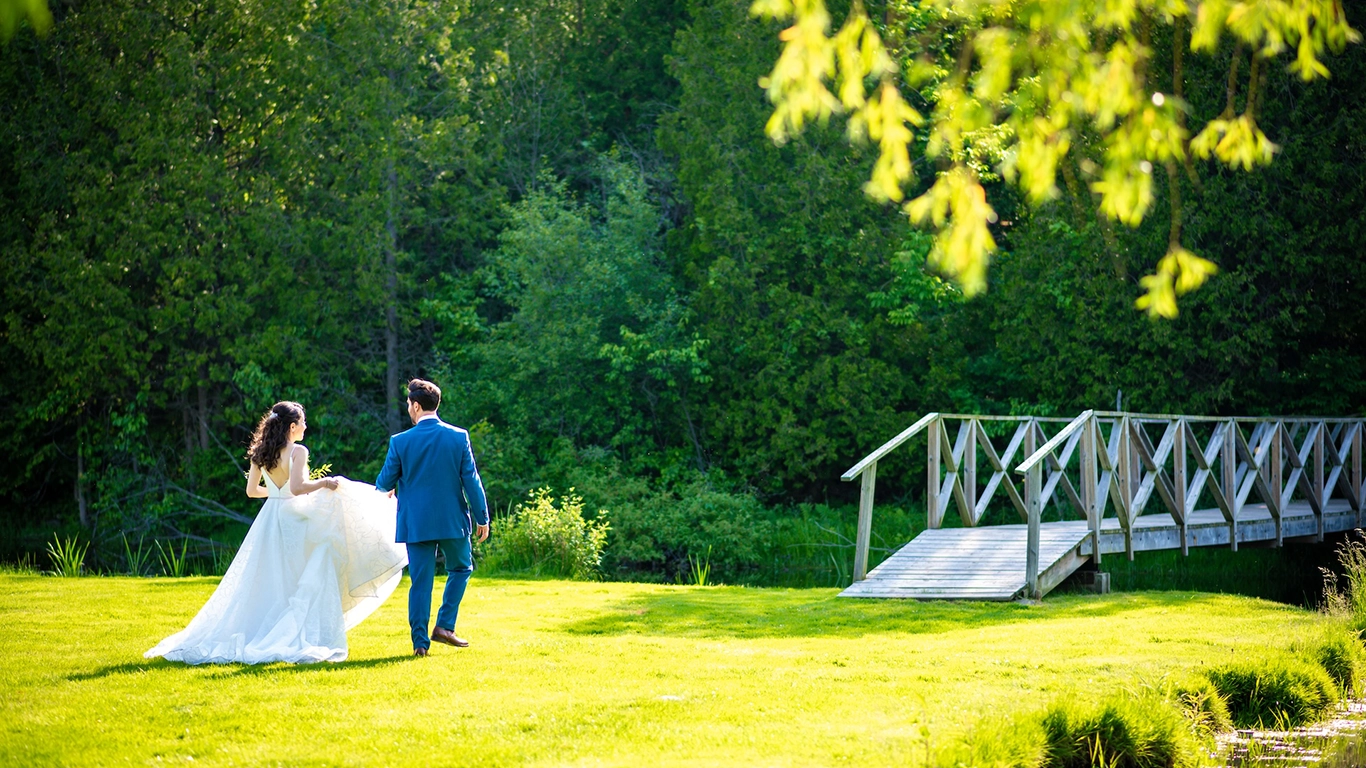Couple walking toward a sunset happy thattheir wedding went well, as they book good vendors