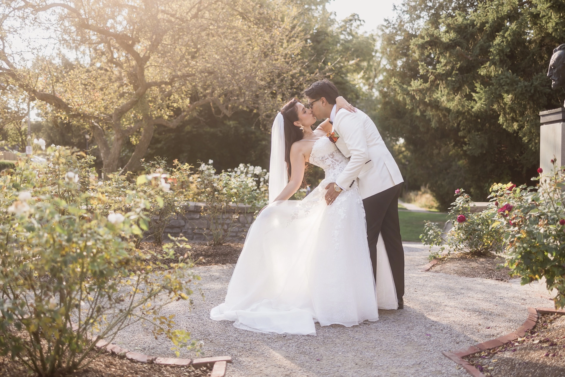 A cinematic kiss in mid-dance at the romantic Shakespearian Garden in Stratford.