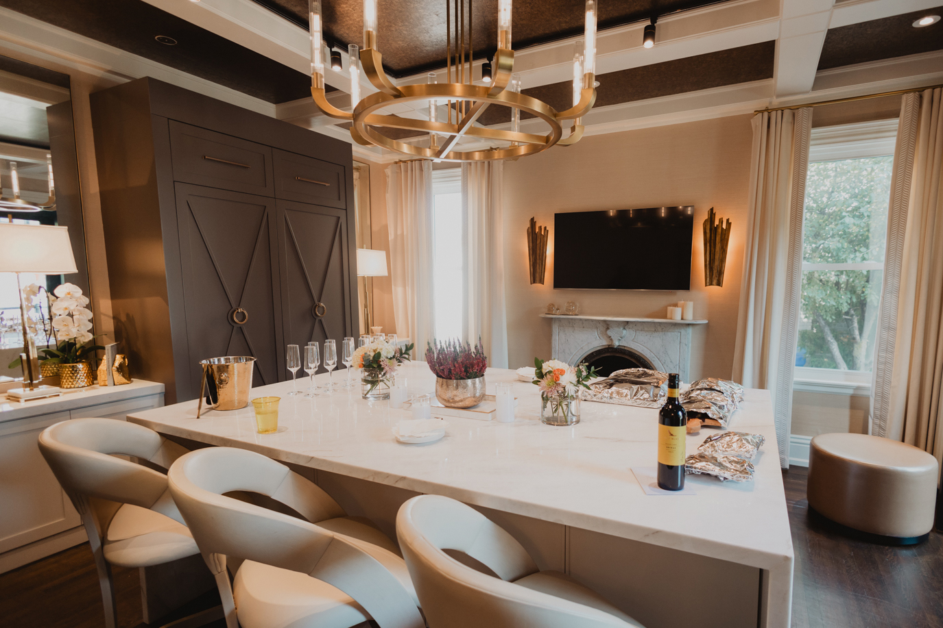 Sarah St. Amand’s beautifully designed Brantford living room styled for a micro wedding, complete with food and champagne for guests.