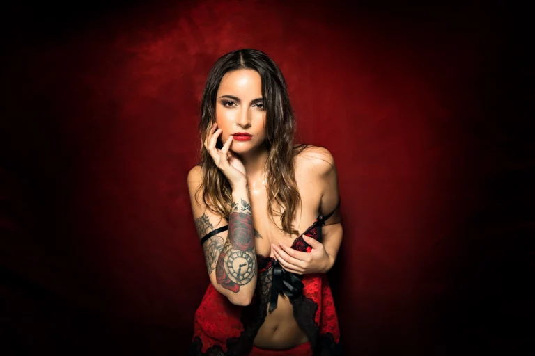 Boudoir session with Jennifer Turner – bold red look created in studio