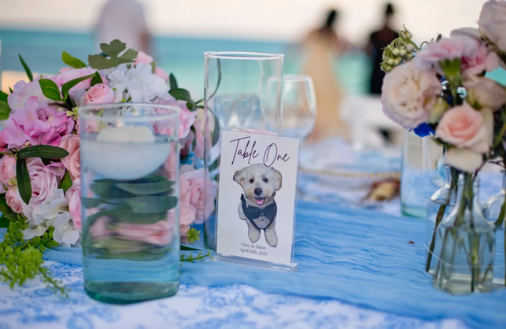 Elegant wedding table number setup on the beach in Mexico
