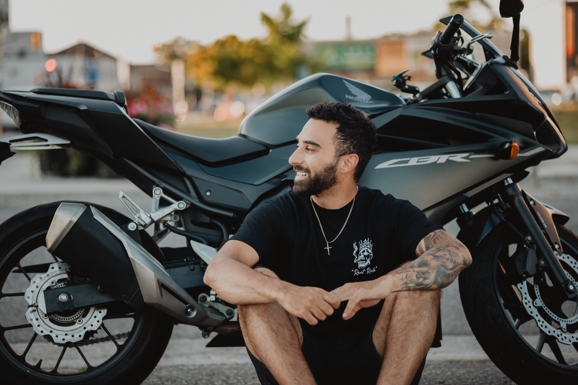 Branding photoshoot in downtown Brantford featuring Rent Rich streetwear by designer Anthony Cappucci with his motorcycle.