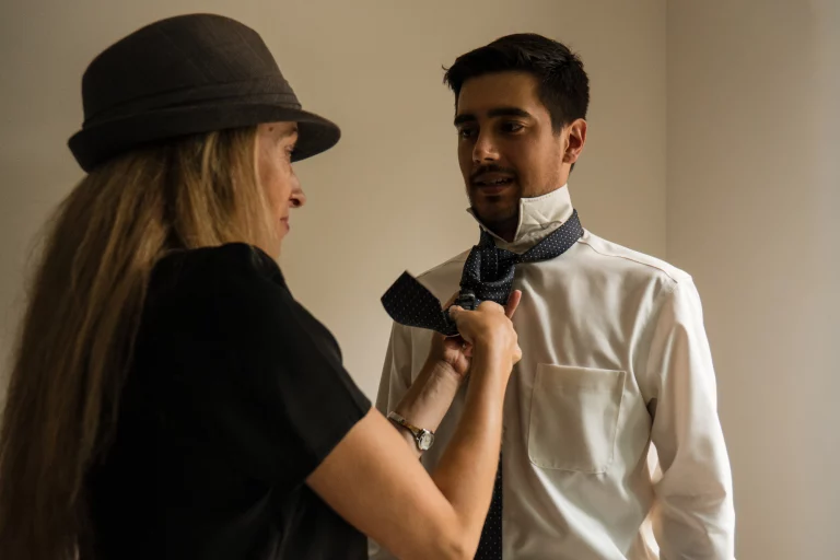 Brantford wedding photographer photography fixing the groom’s tie before the ceremony