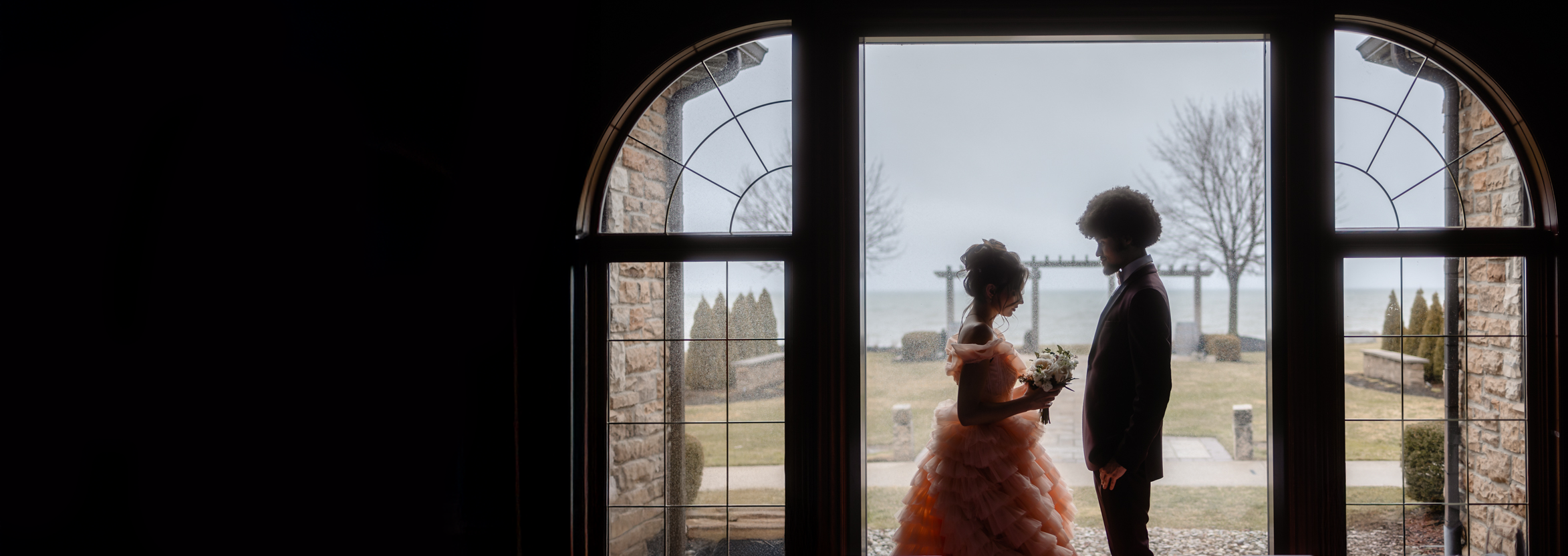 Silhouette of a couple during their wedding ceremony in Brantford Ontario