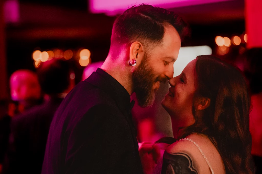 Bride and groom dancing touching noises.
