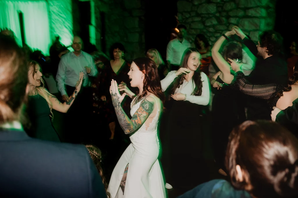 Bride dancing during wedding dance party.
