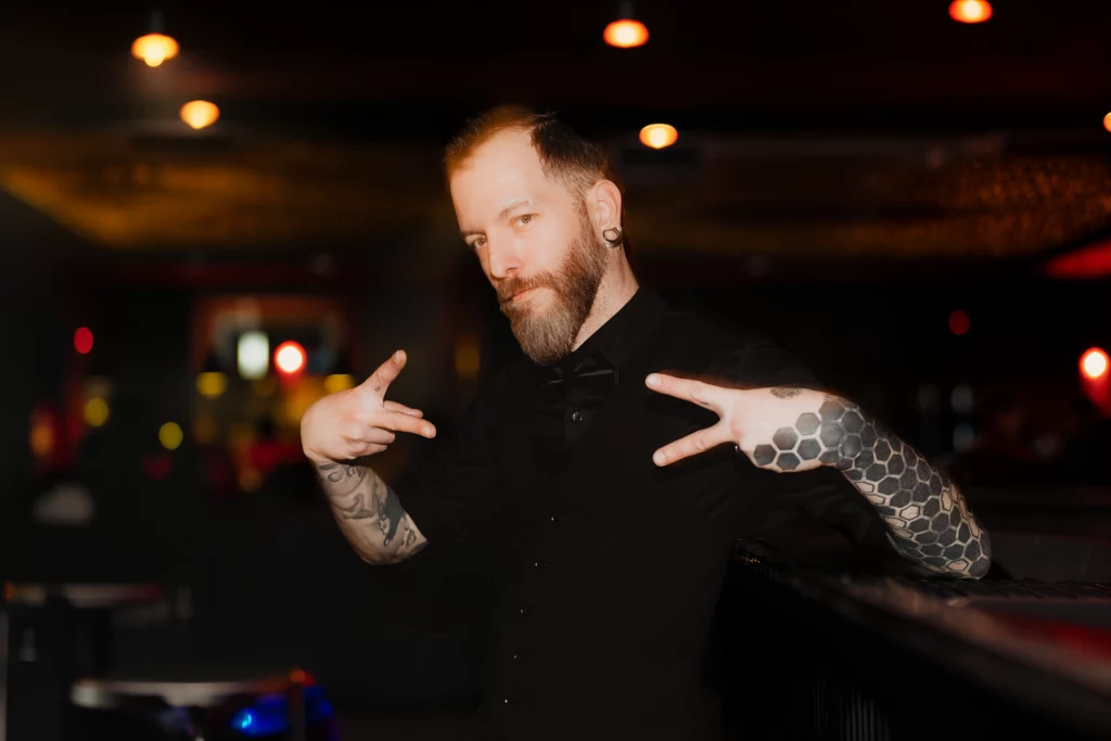 Groom dancing to the rock music.