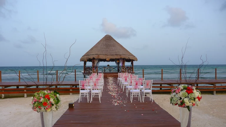 destination wedding on sandy beach with ocean backdrop
